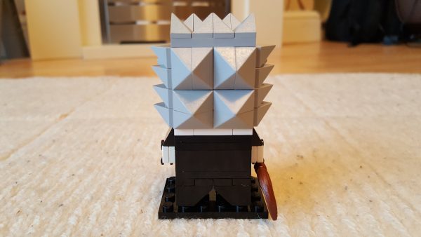 The back of a Lego Brickheadz style representation of Madam Hooch