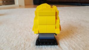 The back of a Lego Brickheadz style representation of Luna Lovegood