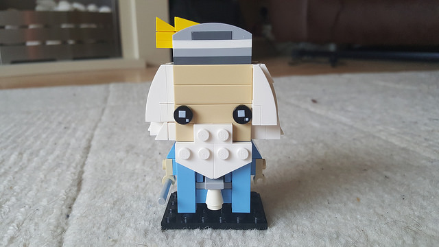 Dumbledore represented in the Lego Brickheadz style