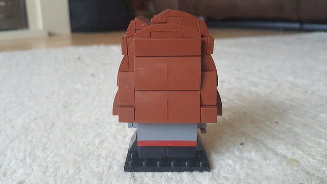 The back of Hermione represented in the Lego Brickheadz style